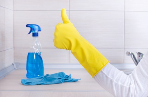 Weekly domestic cleaning checklist with household cleaning tools
