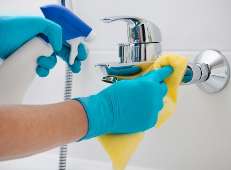 Bathroom move out cleaning with disinfecting supplies